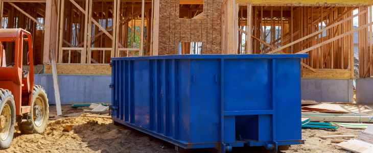 Dumpster outside residential construction site