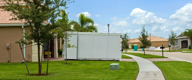 Portable storage unit in residential driveway