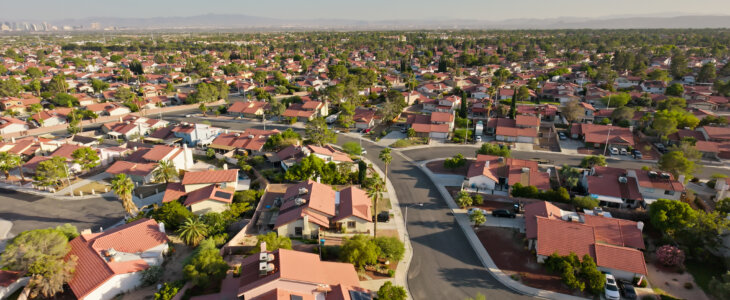 Aerial view of tract housing in the Angel Park neighborhood in Summerlin South, Clark County, Nevada, on a clear, sunny day in Fall.