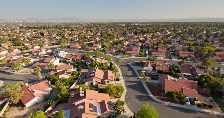 Aerial view of tract housing in the Angel Park neighborhood in Summerlin South, Clark County, Nevada, on a clear, sunny day in Fall.
