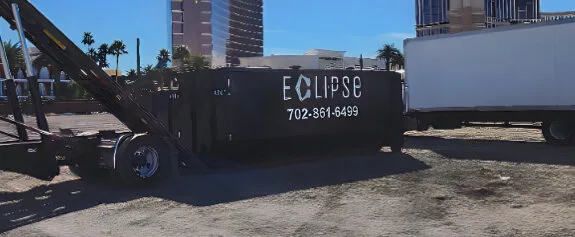 Eclipse Waste dumpster being dropped off in Las Vegas
