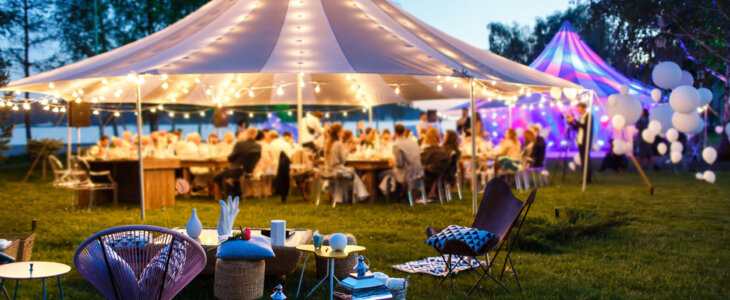 Colorful wedding tents at night. Wedding day.